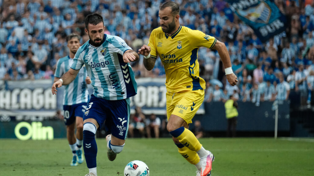 Jesé Rodriguez (right), a striker for UD Las Palmas, in a match against Málaga C.F